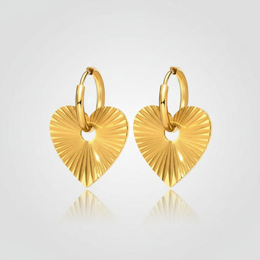 Gold heart-shaped earrings with measurements on a white background